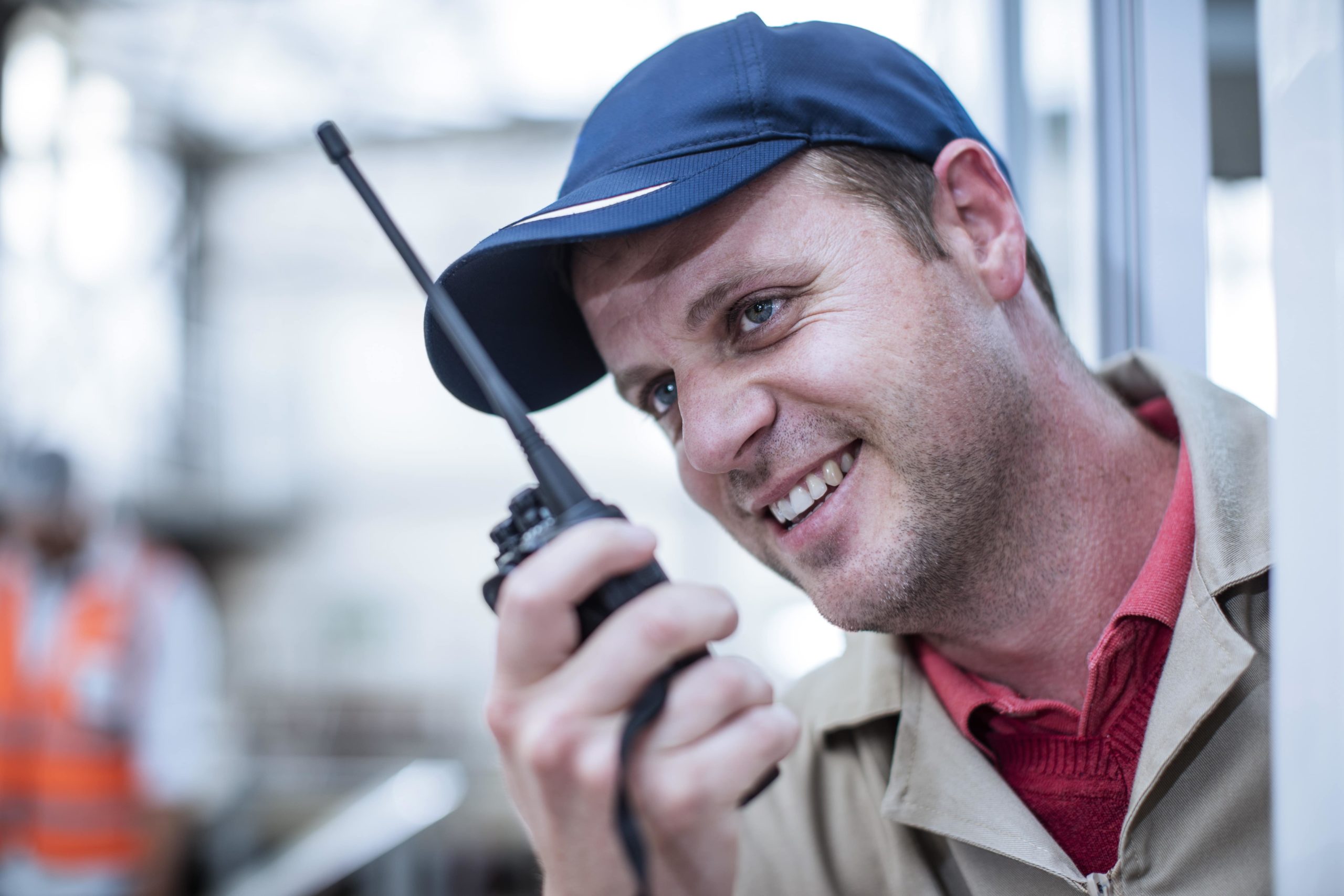 cleaniowallc employee holding phone